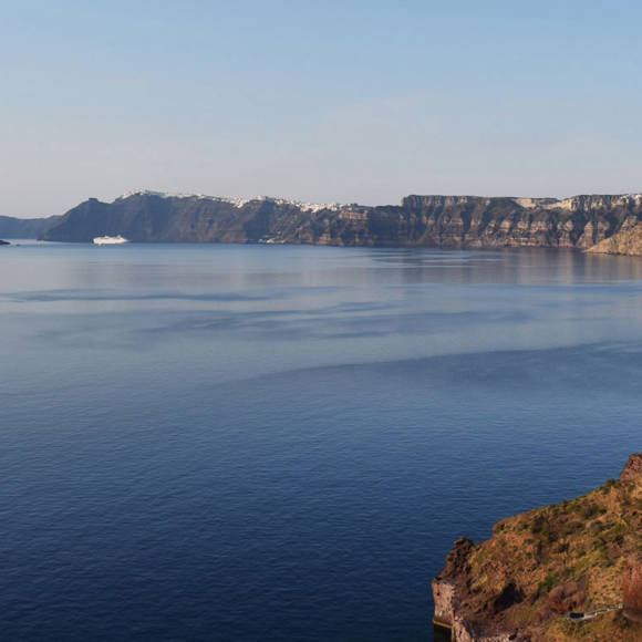 Caldera view of Santorini from Grand Ambassador hotel with cliffs and Aegean Sea