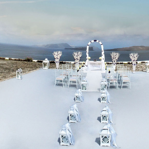 Grand Ambassador wedding venue outdoor ceremony setup with white chairs and arch overlooking the sea