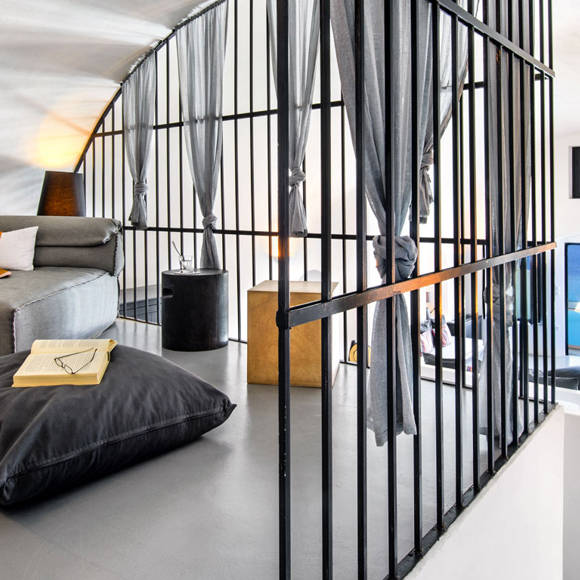 Grand Ambassador Santorini Infinity Cave Suite spacious vaulted living area with sea view