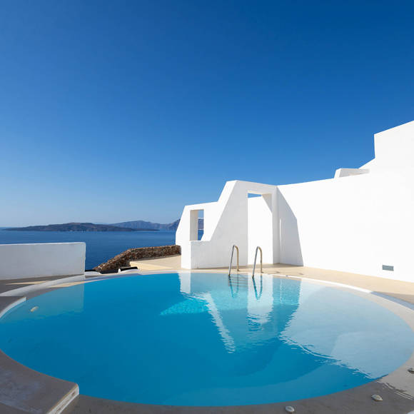 Grand Ambassador Santorini Serenity Two Bedroom Suite private outdoor pool terrace with panoramic caldera and sea views