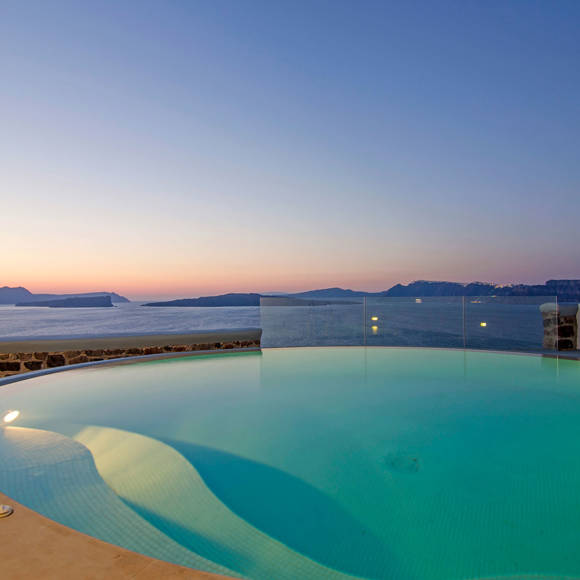 Grand Ambassador Santorini Villa private infinity pool terrace with caldera and sunset views