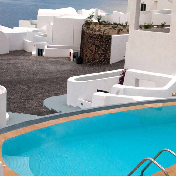 Grand Ambassador Santorini Luxury Suite private outdoor pool with Cycladic architecture